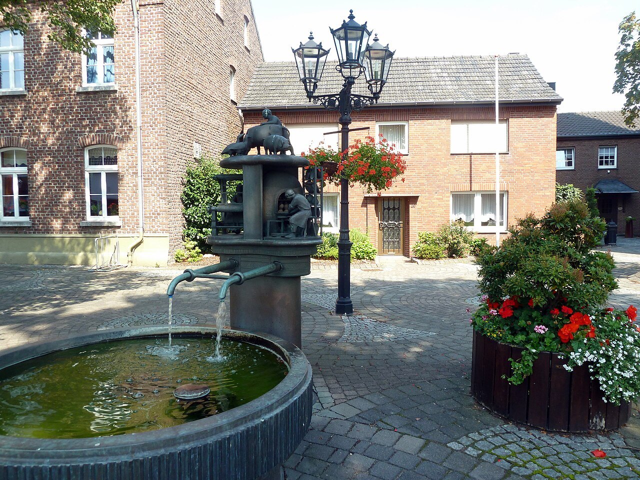 The fountain outside the church in Schaephuysen, municipality of Rheurdt.
