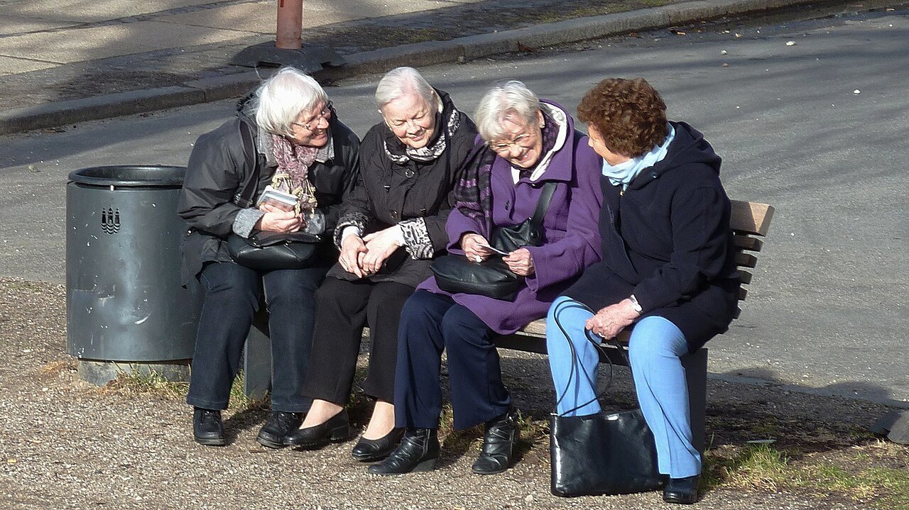 A seated break on a bench in Copenhagen, illustrating time to rest together.