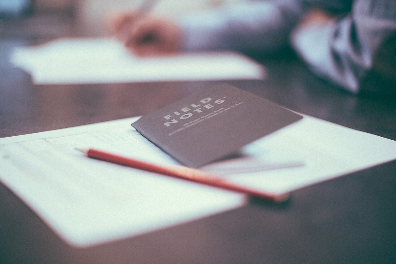 A notebook and pencil for observations on an outing.